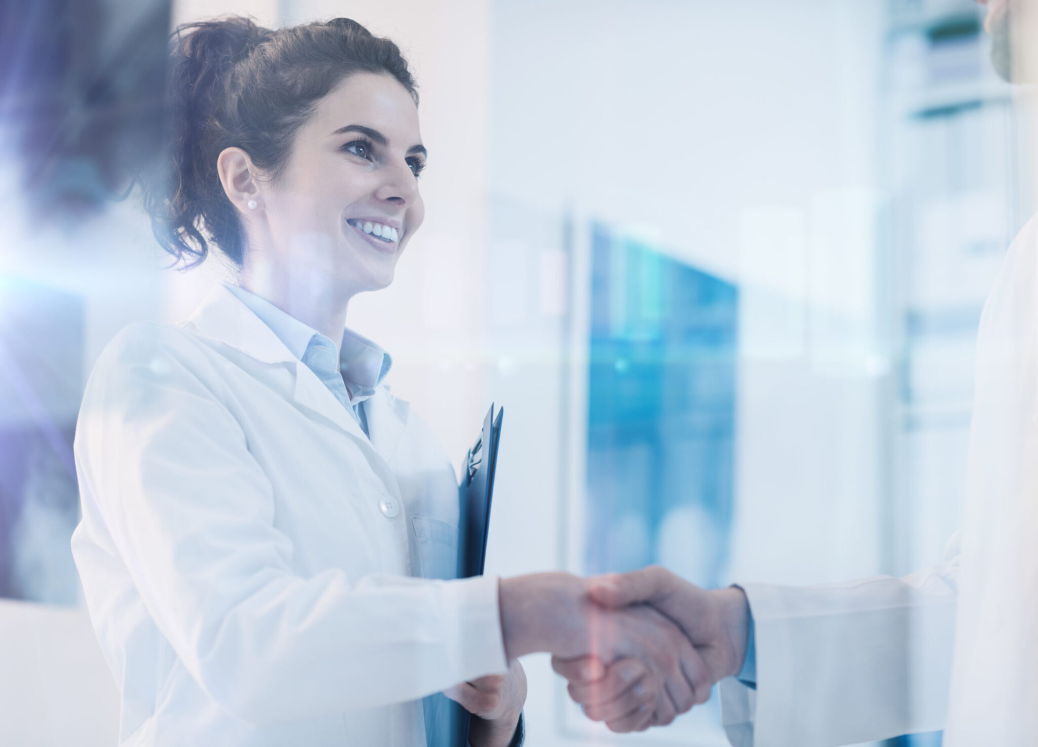 Doctors shaking hands in the office